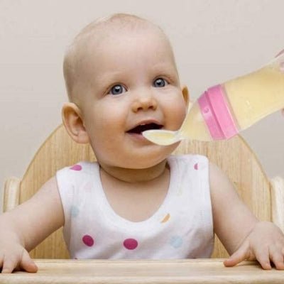 Biberon cuillère - NewBabyFeedingBottle™ - Rose - Calin d'Enfant